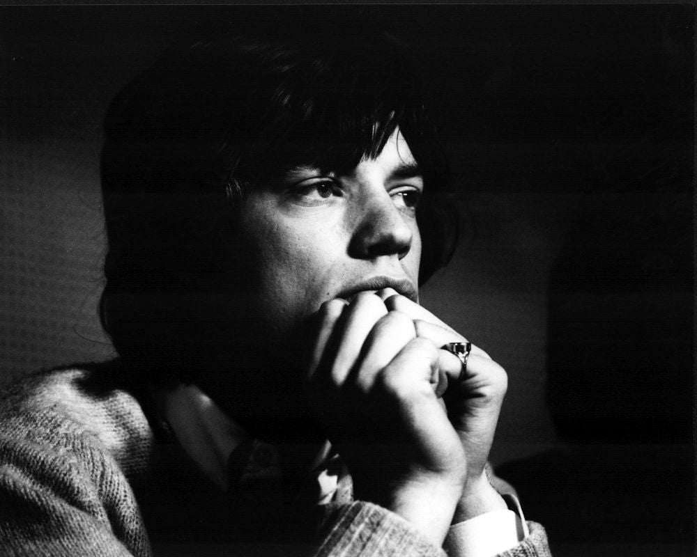 Mick Jagger black and white photo print with hands on chin