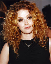 Stylish portrait photo print of Natasha Lyonne in a black sleeveless top.