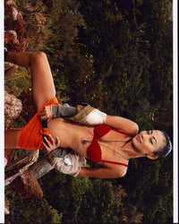 Bai Ling photo print in red bra and orange skirt, vibrant fashion art