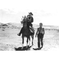 The Searchers movie photo print showcasing a classic cinematic scene.