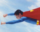 Superboy Flying High in The Sky Photo Print, colorful superhero art