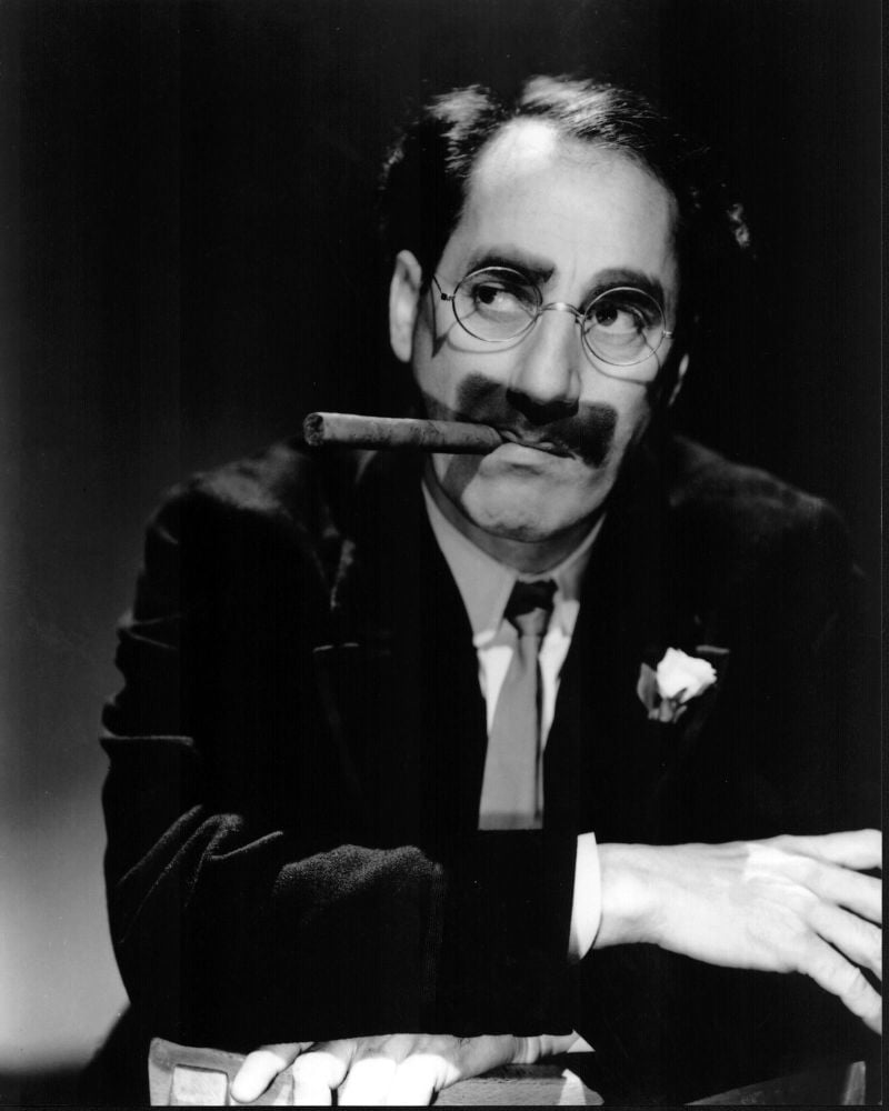 Groucho Marx black and white photo print with cigar and arms crossed.