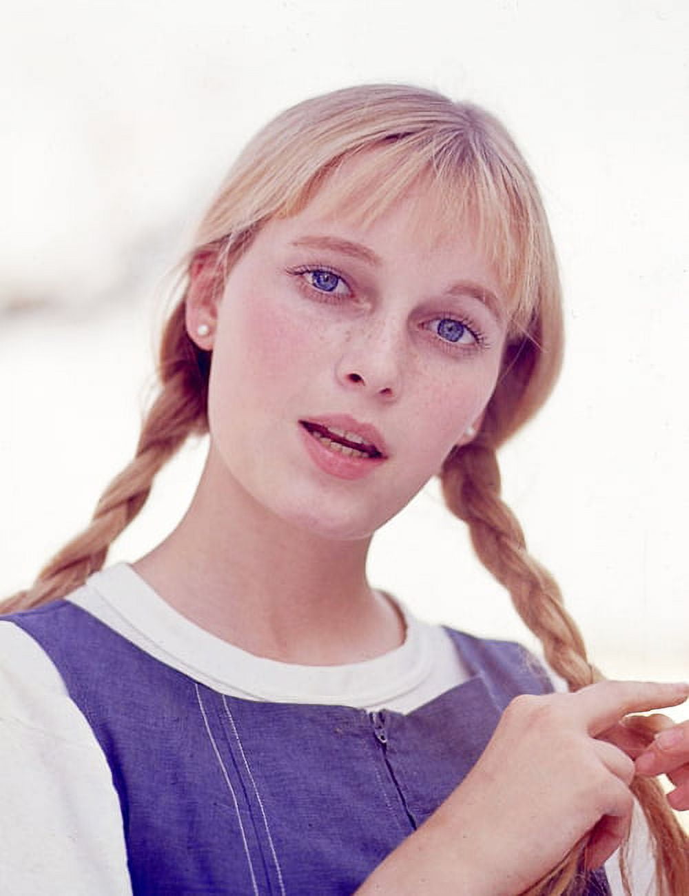 Mia Farrow Pig Tails Photo Print, a nostalgic vintage image.