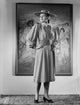 Maureen O'Hara standing in formal dress black and white photo print.