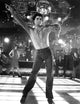 Saturday Night Fever movie photo print showcasing vibrant disco era energy.
