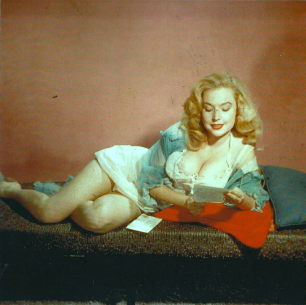 Betty Brosmer Reading Photo Print showcasing vintage elegance.