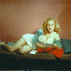 Betty Brosmer Reading Photo Print showcasing vintage elegance.