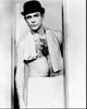 Black and white photo print of Sean Connery wearing a bowler hat and towel.