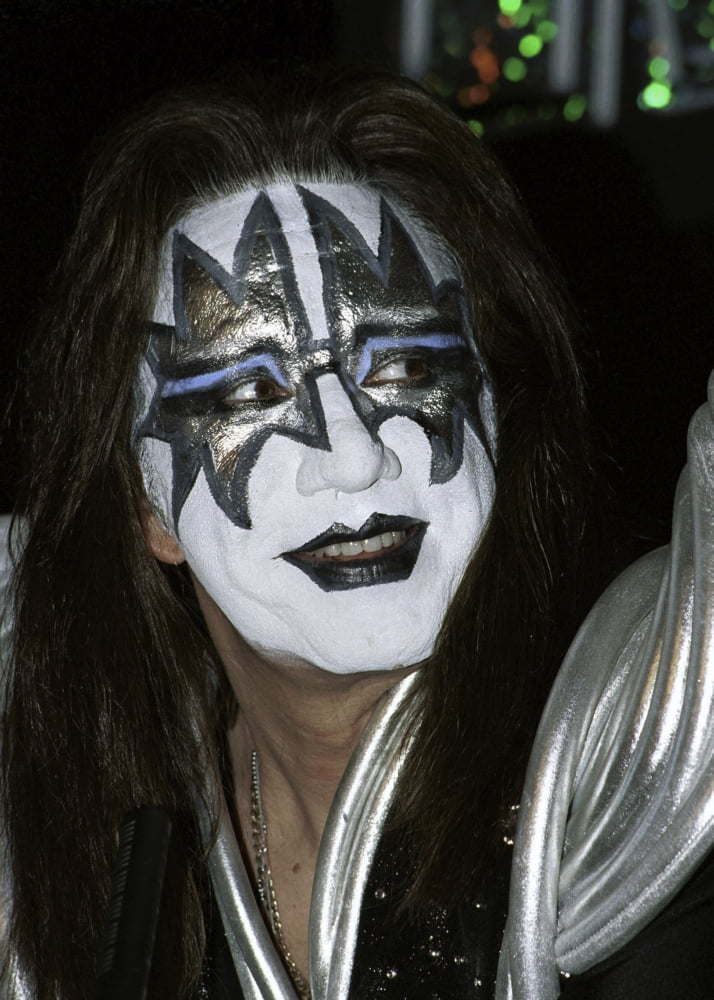 Smiling photo print of Ace Frehley, legendary KISS guitarist.