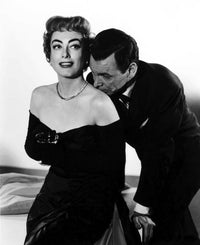 Joan Crawford intimate moment photo print showing actor kissing her shoulder.