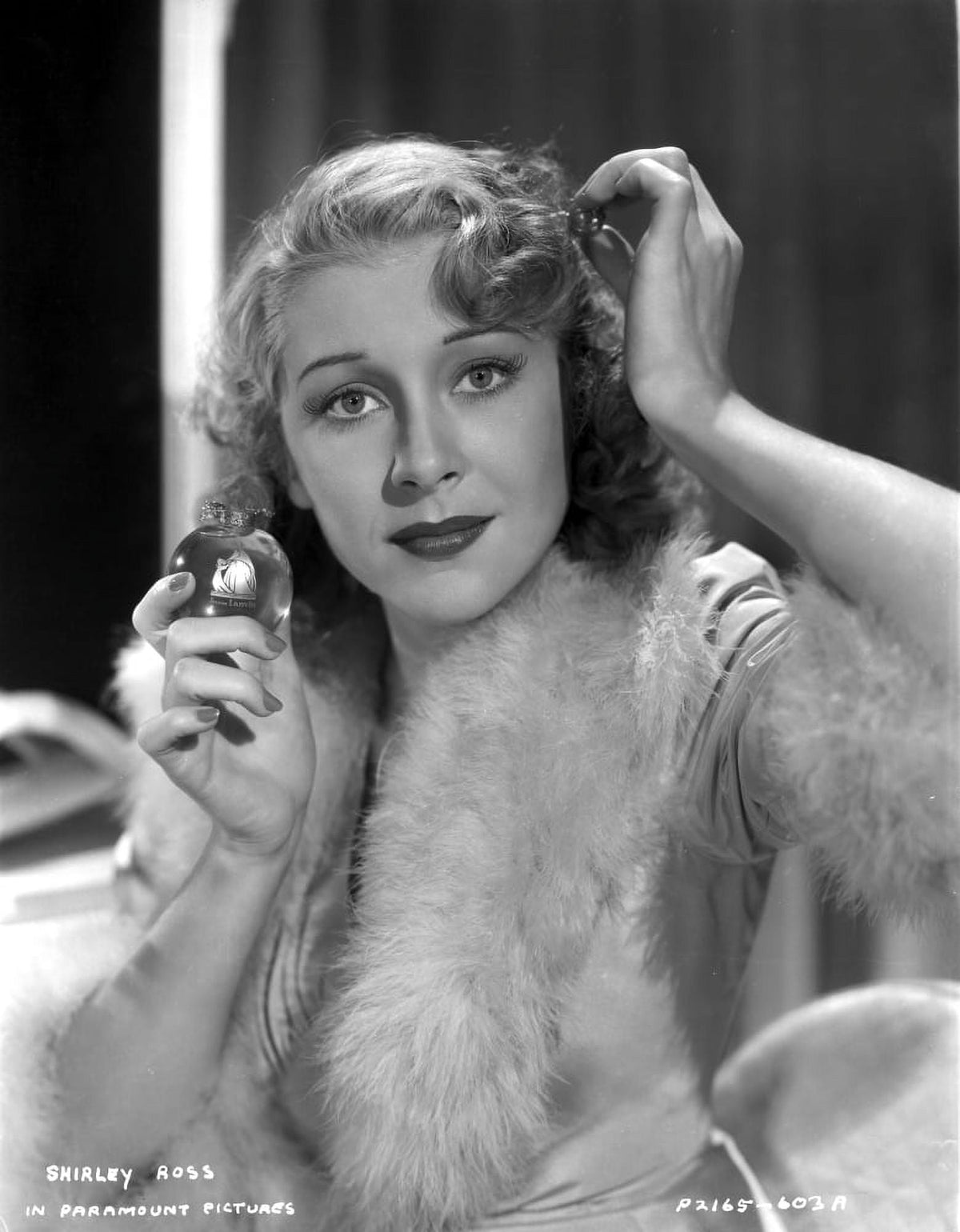 Shirley Ross vintage photo print of putting on perfume