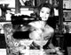 Sophia Loren pouring champagne photo print