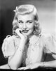 Portrait photo print of Ginger Rogers in a white dress, classic Hollywood art.