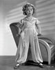 Classic portrait photo print of Shirley Temple in cap-sleeve shirtdress