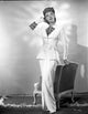 Eve Arden standing in a long sleeve blouse photo print.
