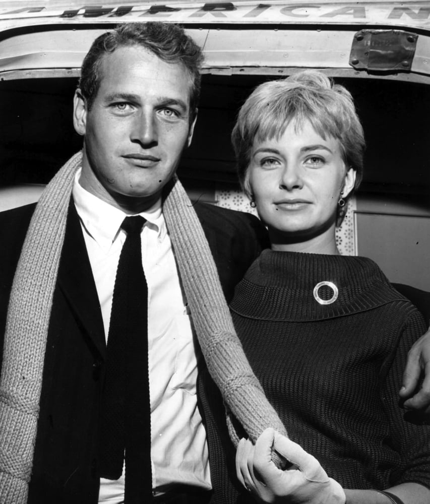 Photo print of Paul Newman and Joanne Woodward capturing classic Hollywood charm.