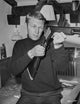 Steve McQueen pointing rifle black and white portrait photo print