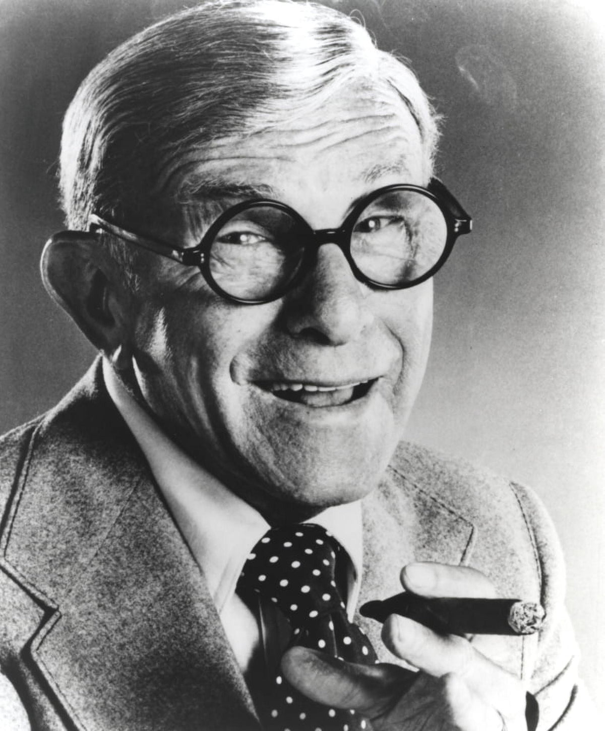 George Burns smoking a cigar photo print in classic black and white.