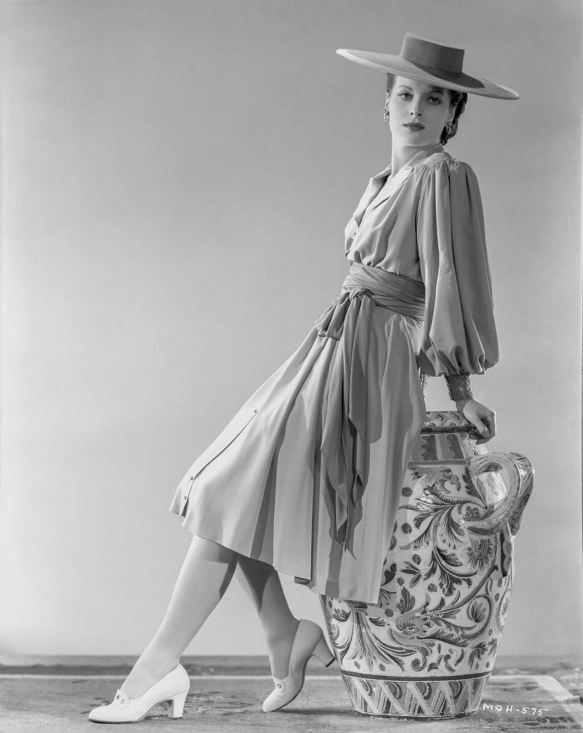 Elegant black and white photo print of Maureen O'Hara in gown and hat