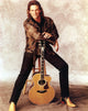 Billy Dean posed in brown leather jacket with guitar photo print.