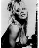 Pamela Anderson leaning forward with wet hair black and white photo print.