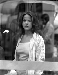 Classic portrait photo print of Linda Blair in a white coat