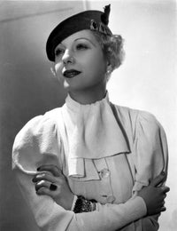 Lilyan Tashman leaning on dress with cap and ring photo print.