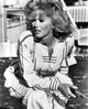 Connie Stevens photo print in white dress with pistol