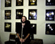 Maurice Gibb photo print in front of platinum records