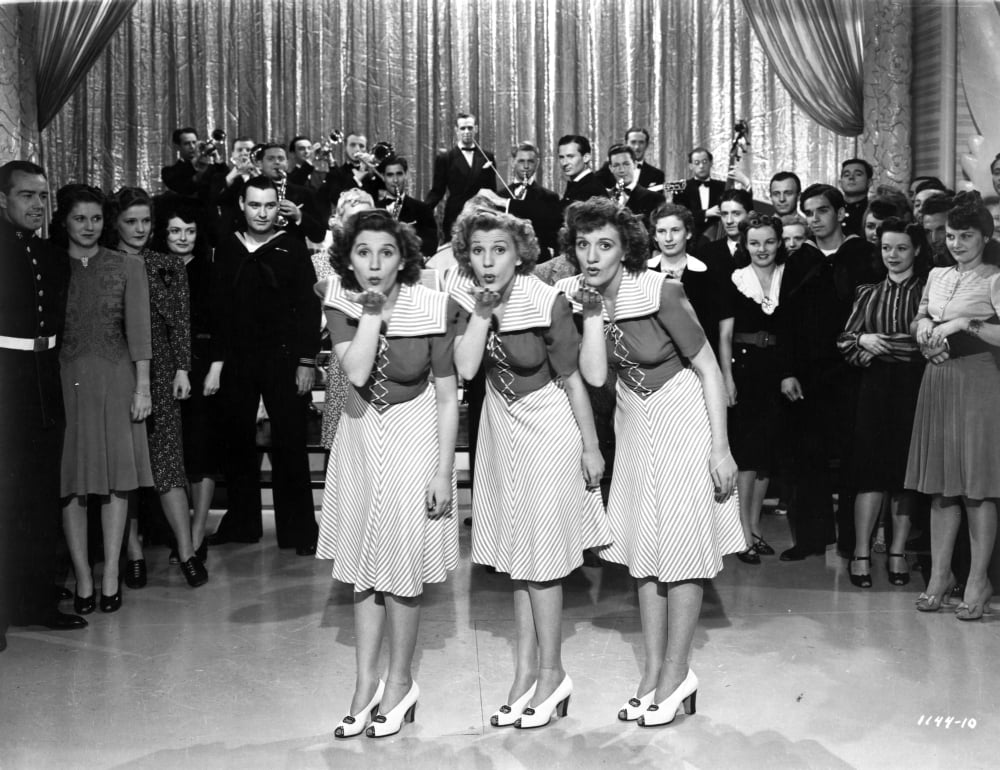 The Andrews Sisters photo print in uniform blowing kisses