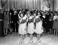 The Andrews Sisters photo print in uniform blowing kisses