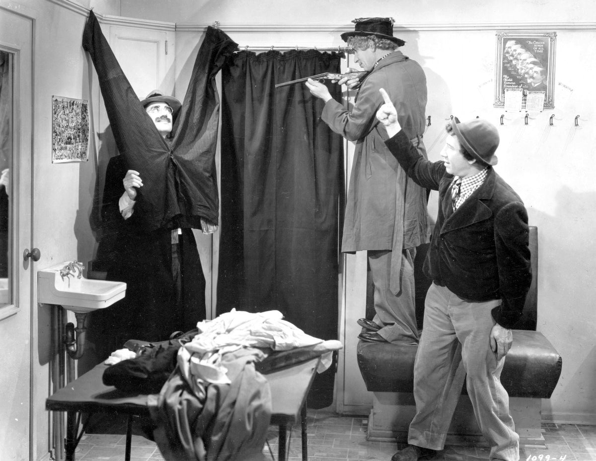 Black and white photo print of the Marx Brothers capturing a classic comedic moment.