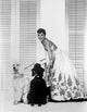 Audrey Hepburn with dogs photo print in black and white.