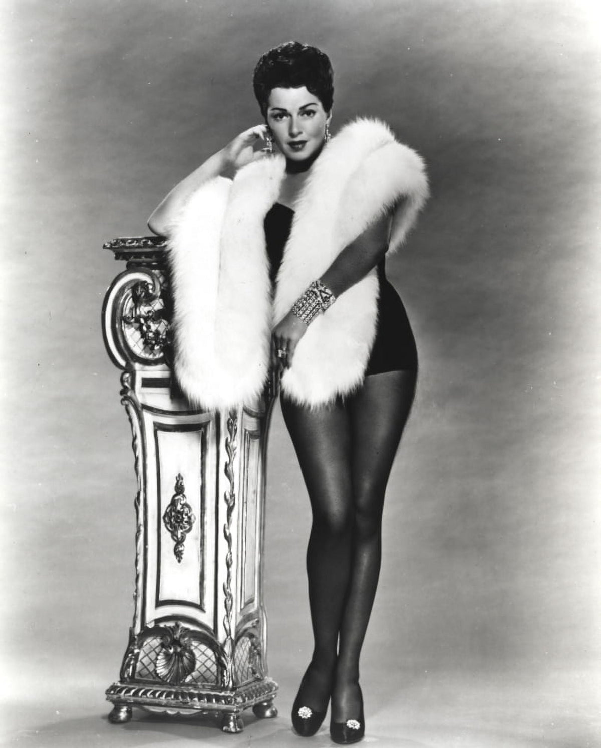 Black and white portrait photo print of Lana Turner wearing an elegant dress.