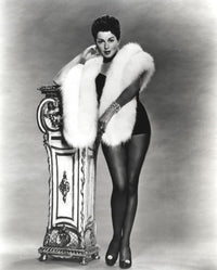 Black and white portrait photo print of Lana Turner wearing an elegant dress.