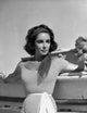 Classic portrait photo print of Elizabeth Taylor in a striped top.