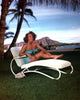 Joan Crawford lounging outdoors photo print, classic Hollywood style.