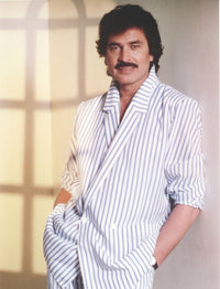 Engelbert Humperdinck posed in a stylish stripe robe photo print.