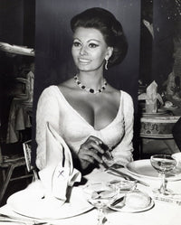 Sophia Loren dining photo print, available in multiple sizes.
