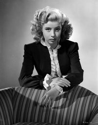 Gloria DeHaven black and white photo print leaning on a chair
