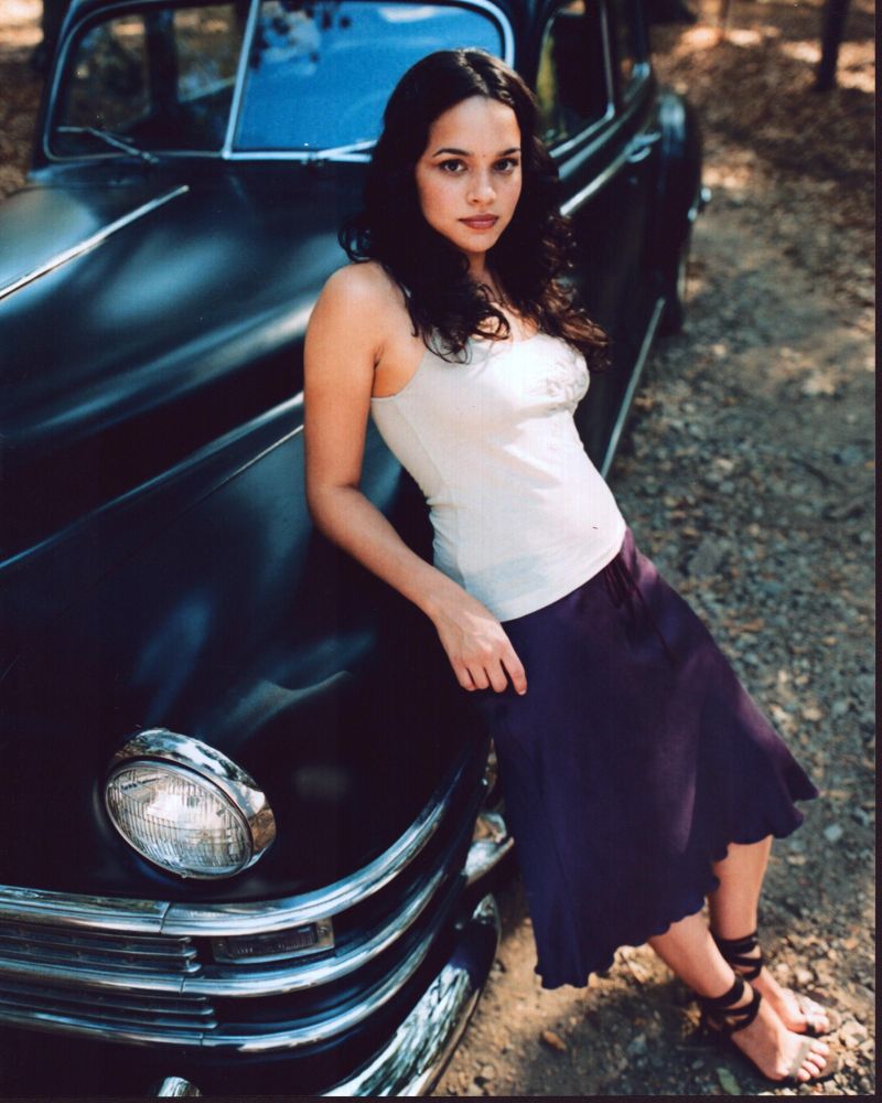 Norah Jones leaning on a classic car photo print