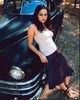 Norah Jones leaning on a classic car photo print