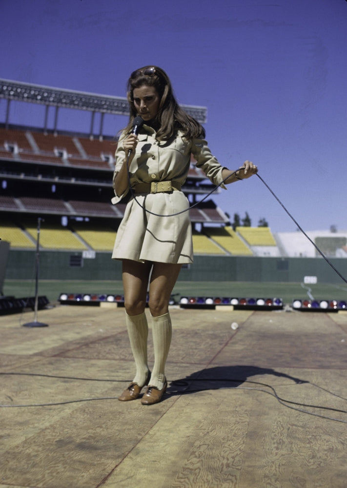 Raquel Welch performing at Dodger Stadium photo print.