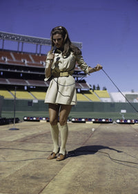 Raquel Welch performing at Dodger Stadium photo print.