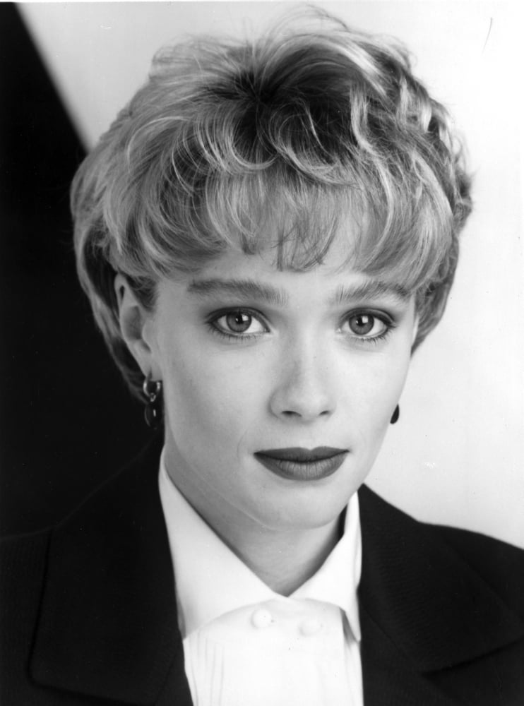 Close up portrait of Lauren Holly in classic photo print.