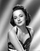 Olivia De Havilland 1946 vintage photo print showcasing classic Hollywood elegance.