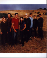 Smallville Cast in Field Photo Print - 8x10, featuring iconic characters.