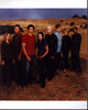 Smallville Cast in Field Photo Print - 8x10, featuring iconic characters.