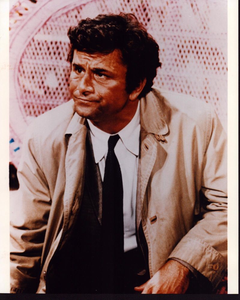 Peter Falk as Columbo photo print in wicker chair, classic TV scene.