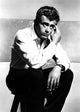 James Dean scratching his face photo print, classic Hollywood icon.